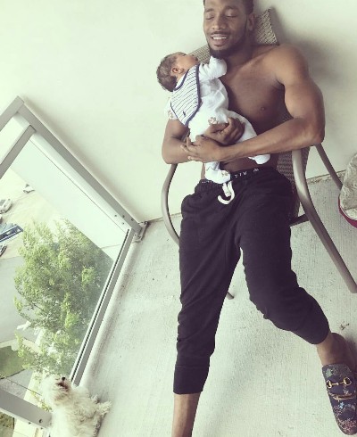Dbanj Cuddles Son in new picture shared by H